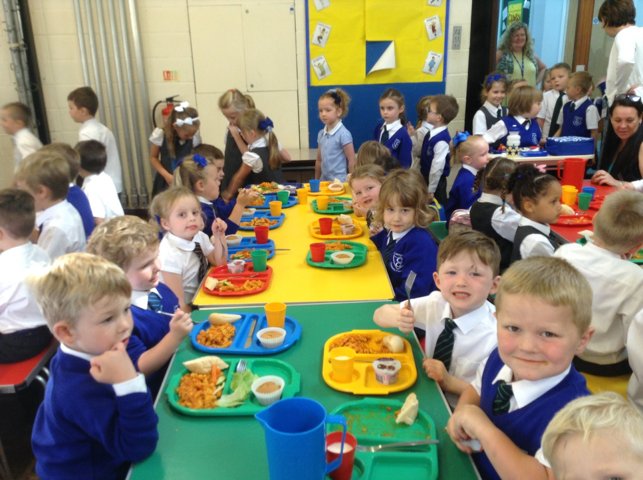 Image of Enjoying our first school dinners!
